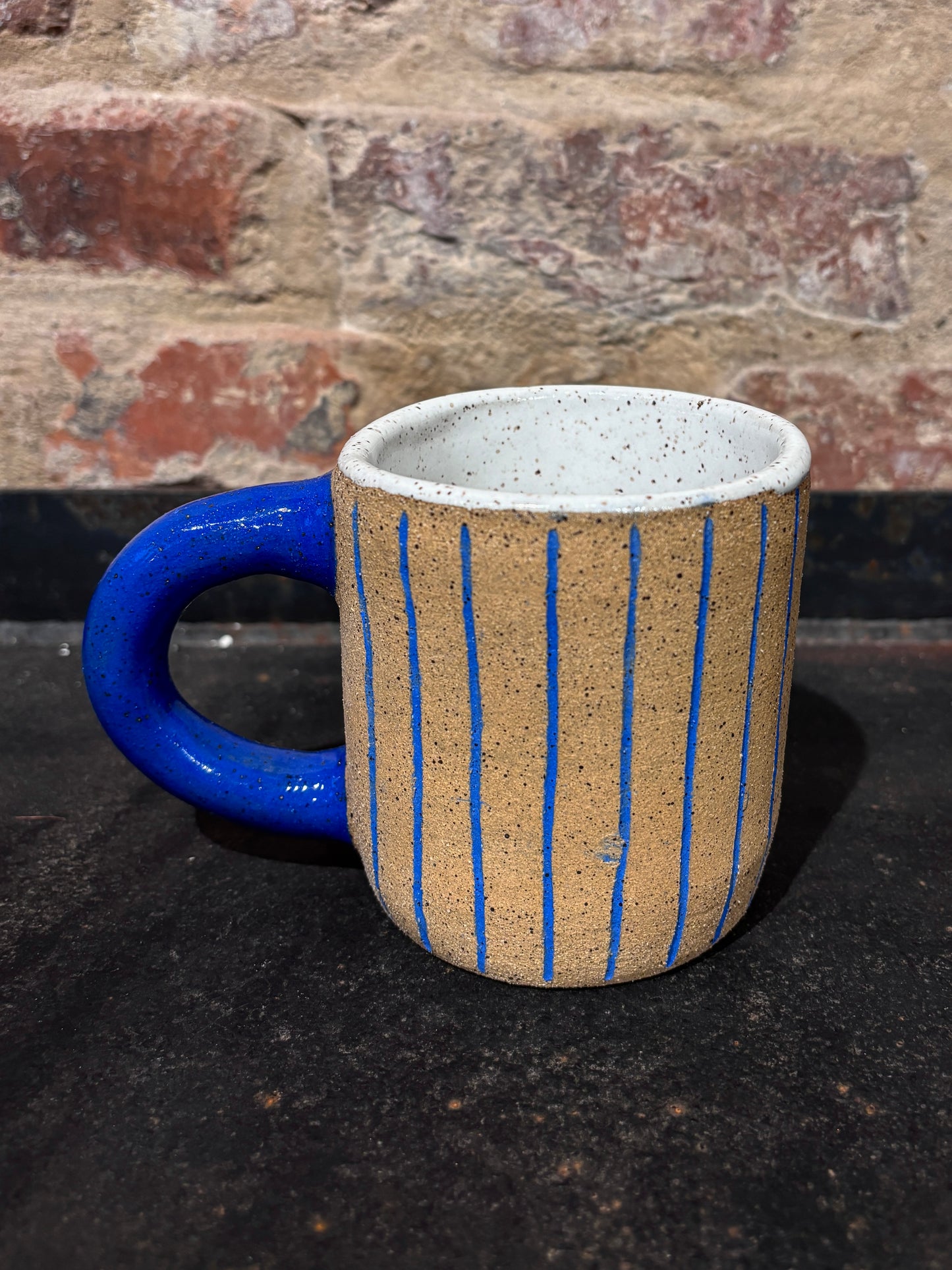 'Hand Wings' Stripped Ceramic Mug